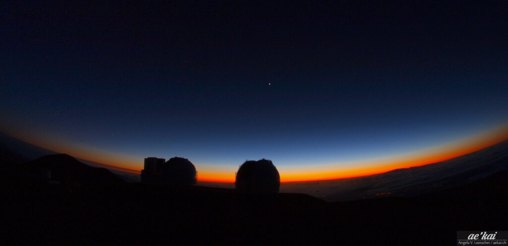 Subaru & Keck I&II Observatories at sunset on top of Mauna Kea in Hawaii
