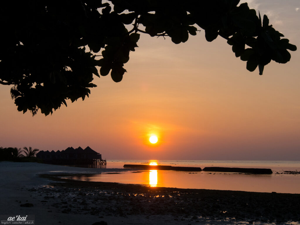 Sunset & Watervillas on Kuredo Island, Maldives